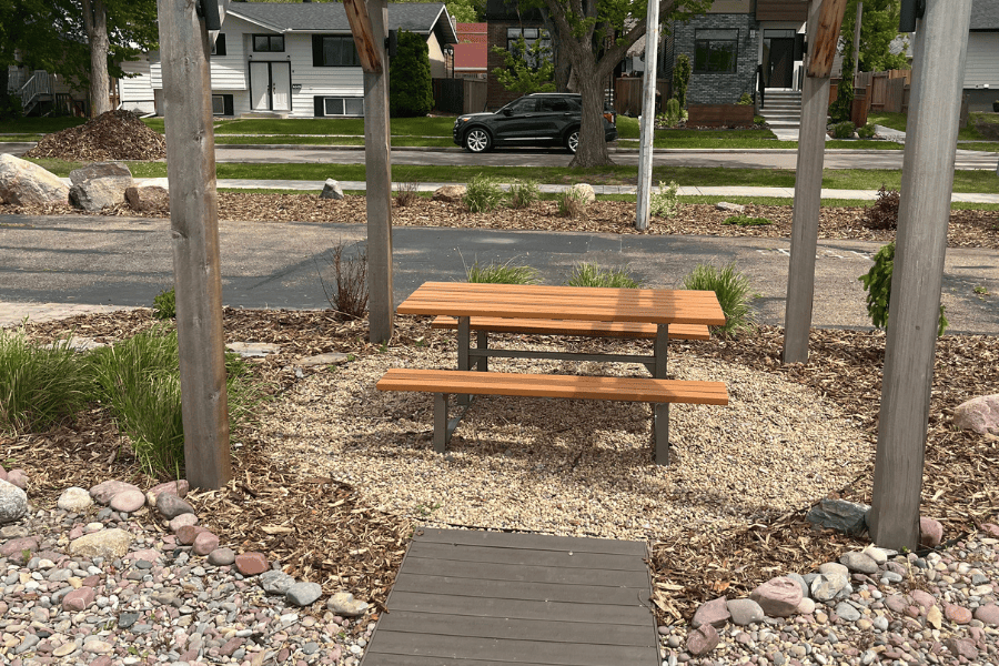 An image showcasing a finished beach rock landscape installation job in Edmonton.
