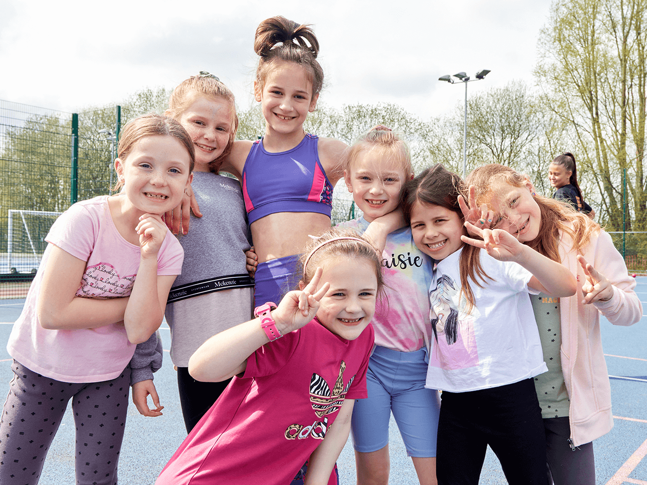 Group of girls at a holiday club posing for a photo.