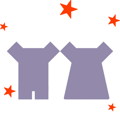A boy and a girl holding hands up in the air.