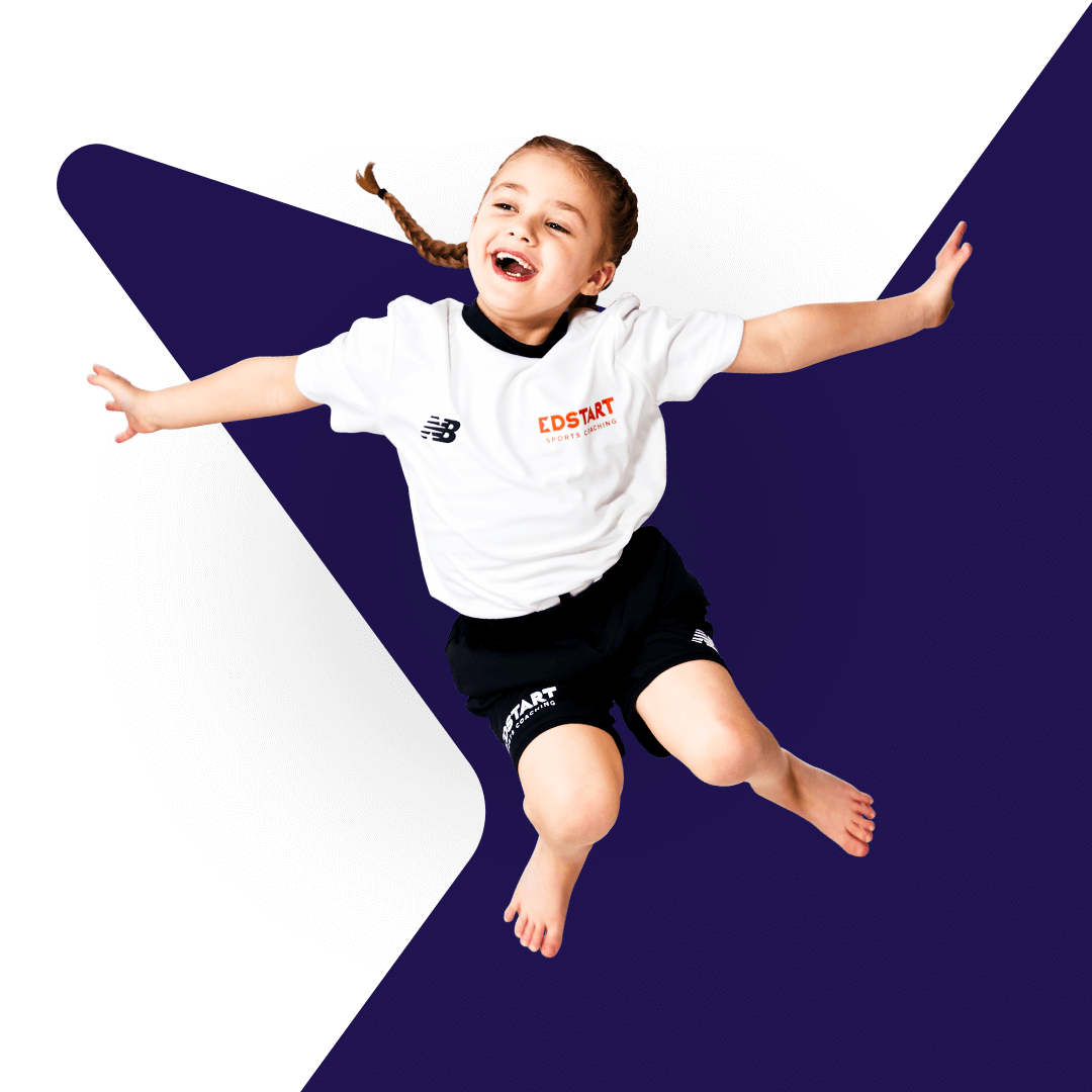 Happy young girl jumping for joy.