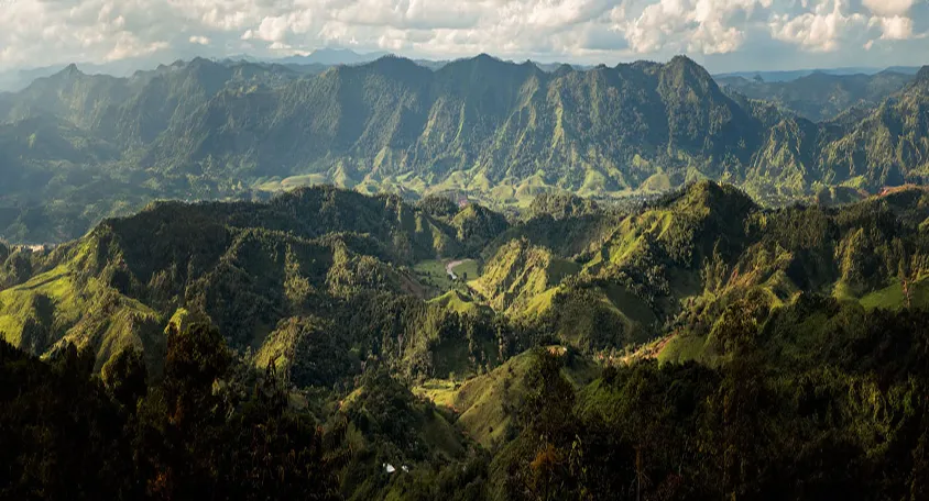 Layered green ridges of the Andes in Antioquia, Colombia