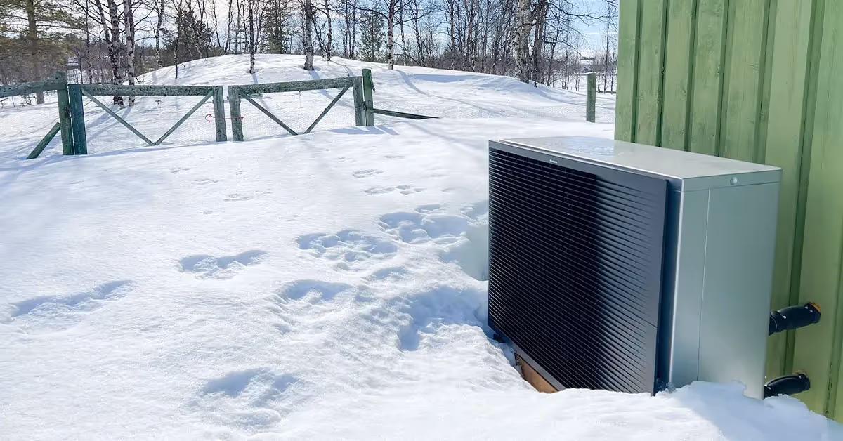Daikin heat pump in the snow