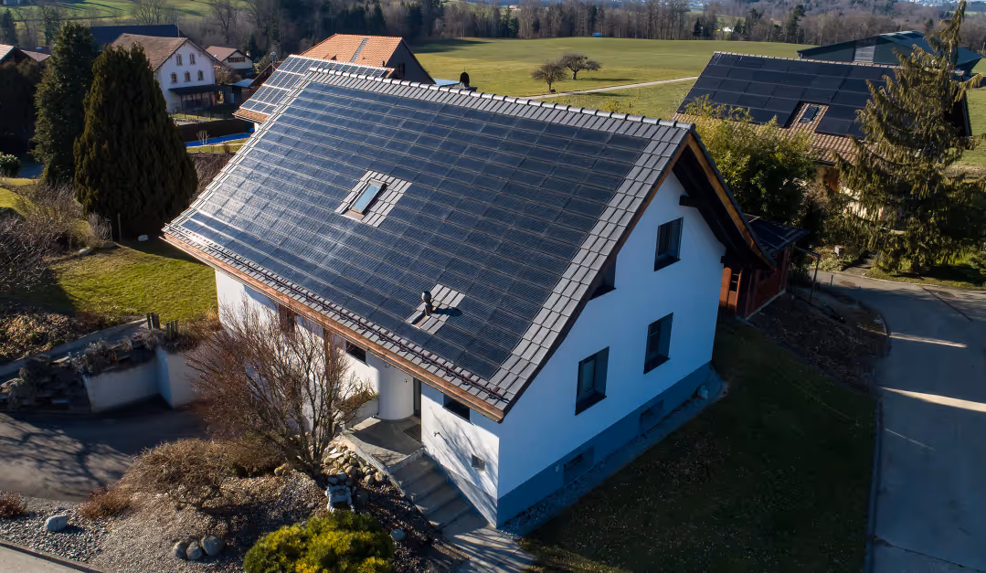 Perlight Solar panels on a countryside roof