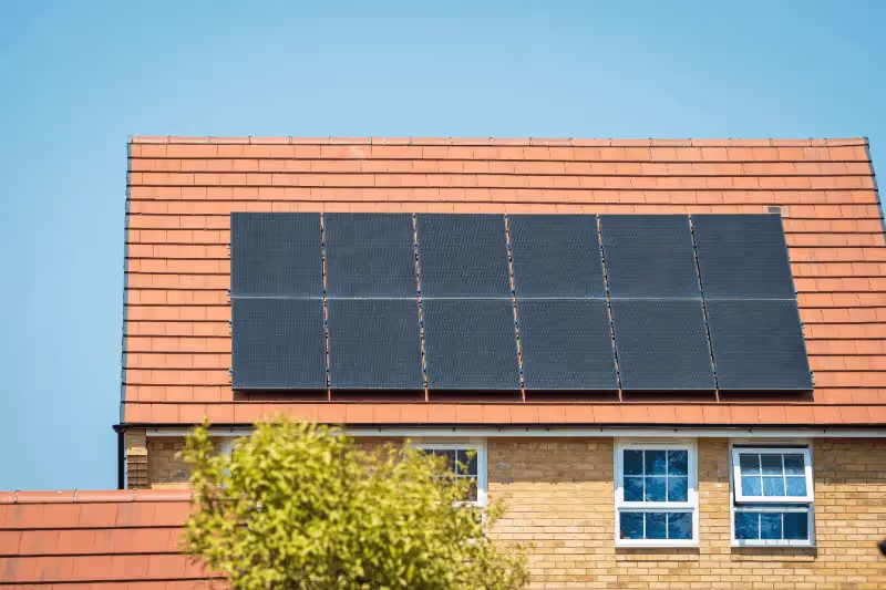 Solar panels on the roof of a modern home