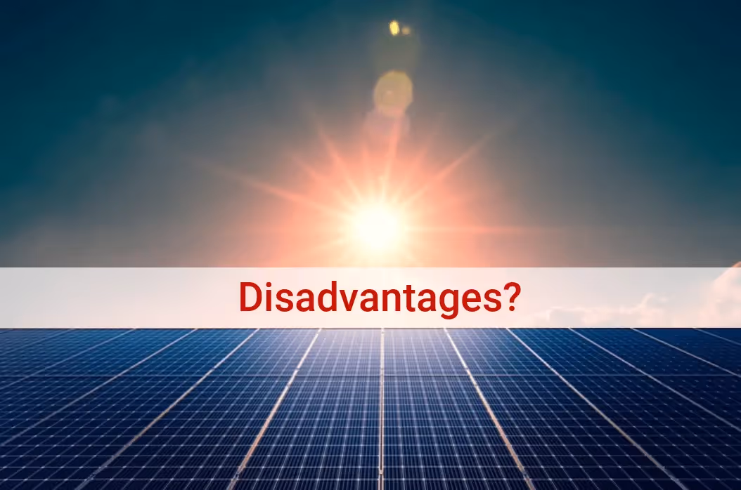 A picture of sun in the sky, with solar panels covering the area below and a banner saying 'disadvantages?'