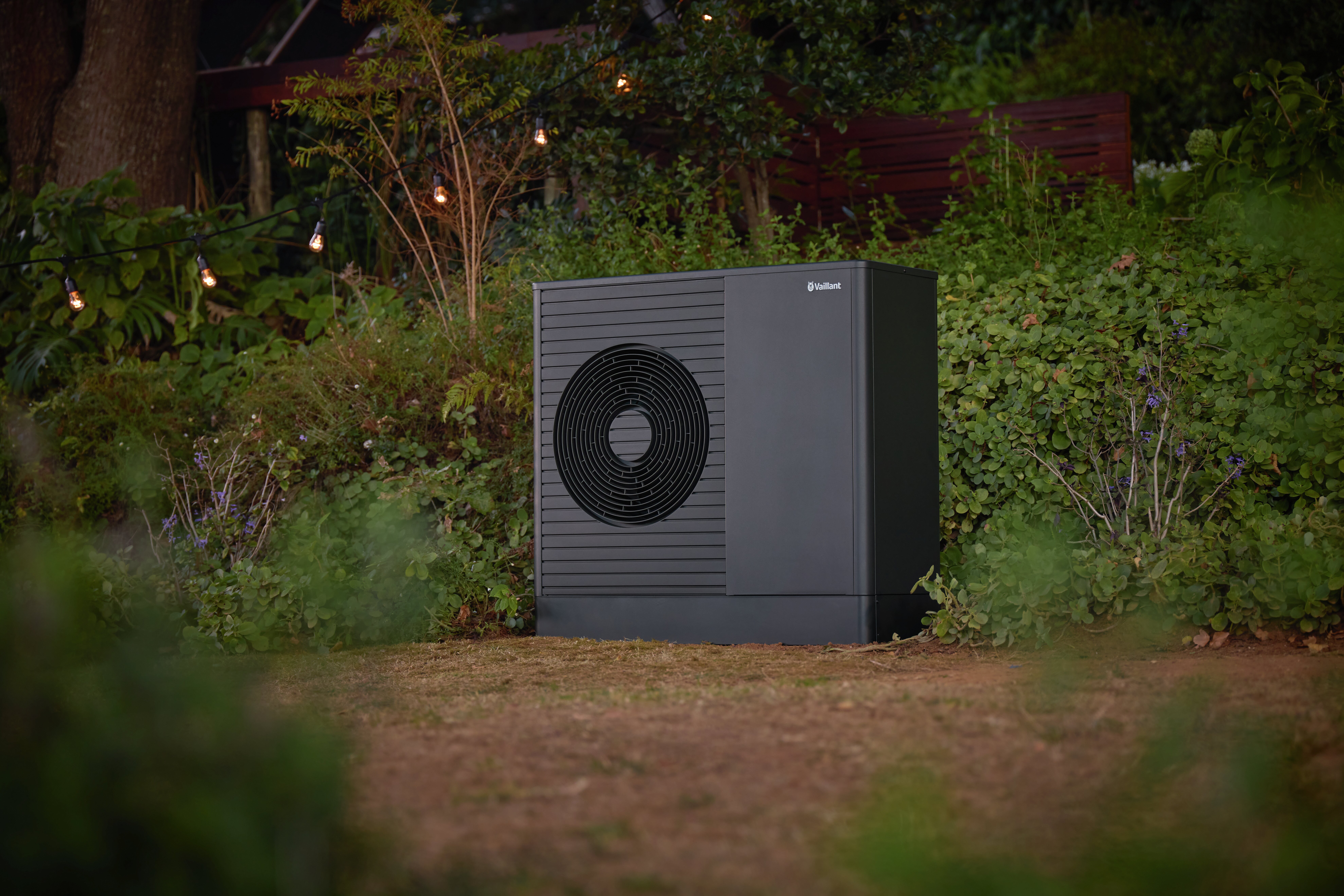 Vaillant's new aroTHERM Plus heat pump in a garden