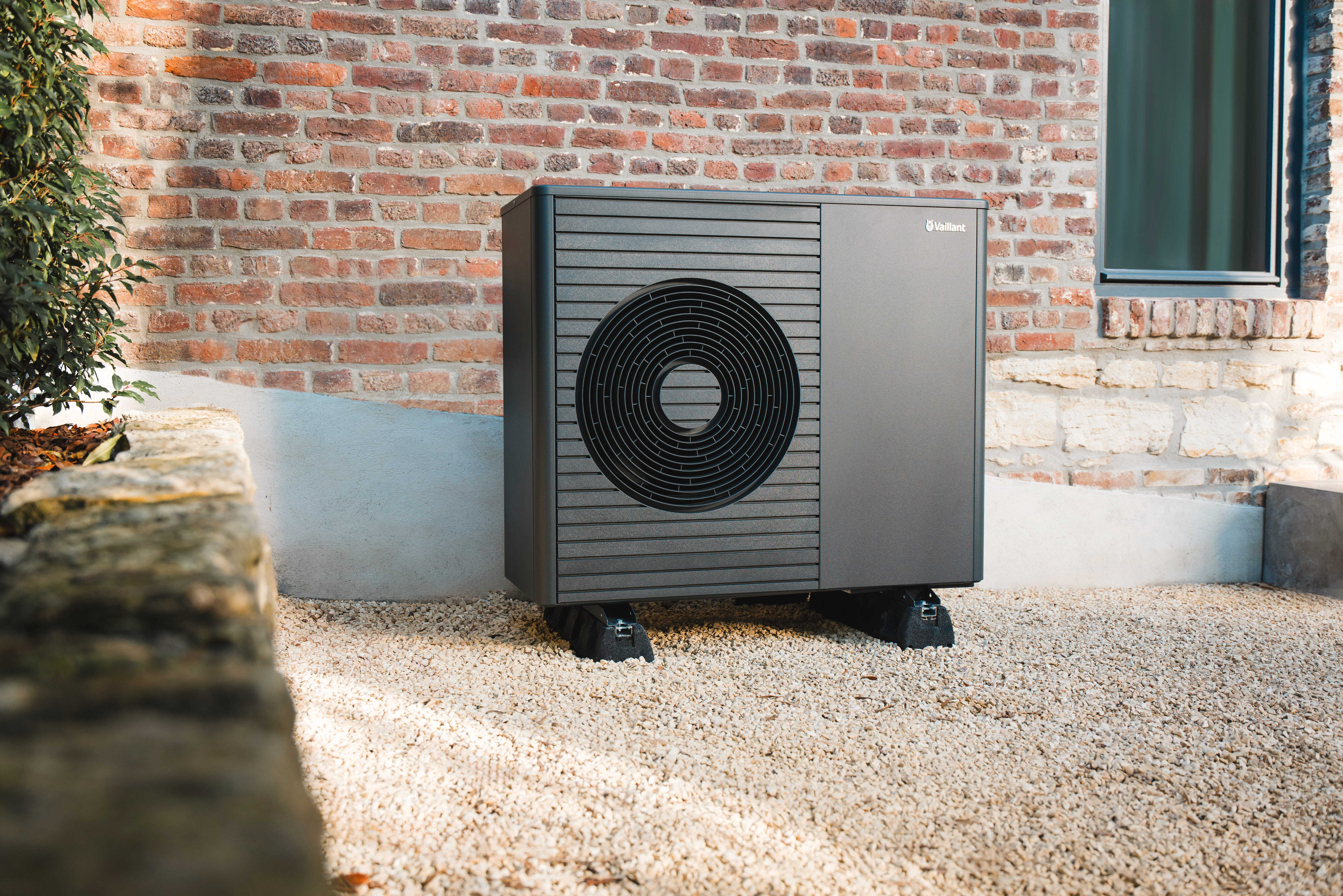 Vaillant's new aroTHERM Plus heat pump in a garden