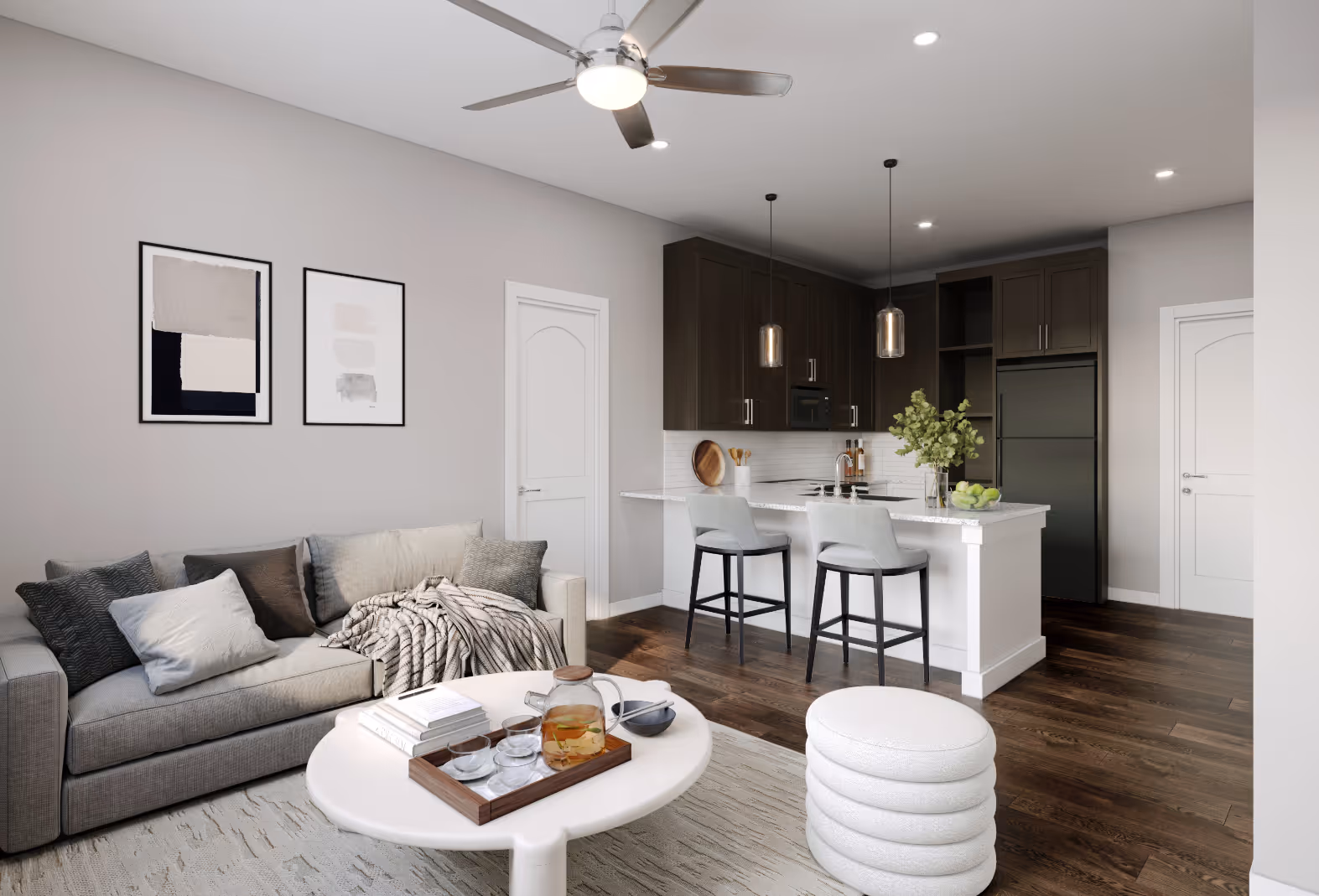 3D Rendering of Living area with sofa and coffee table and view of Kitchen with breakfast bar with chairs