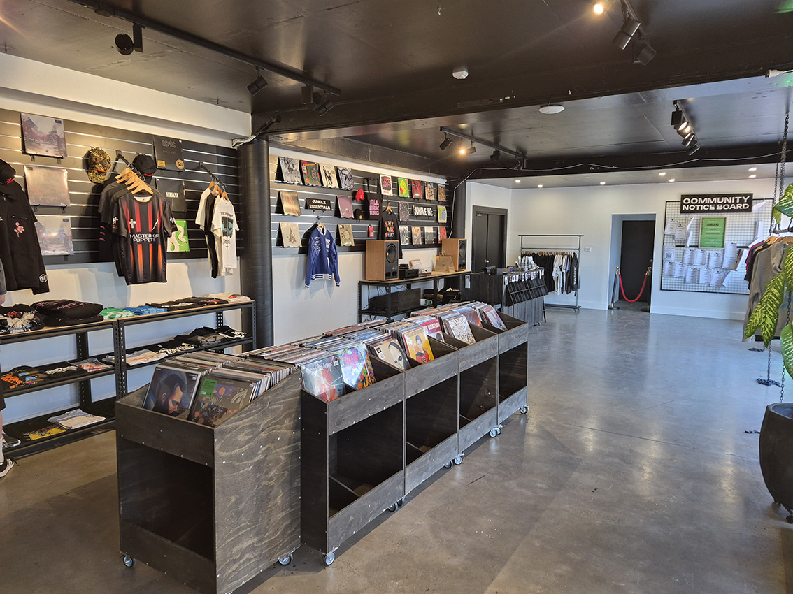 Vinyl racks and merchandise inside Jungle HQ