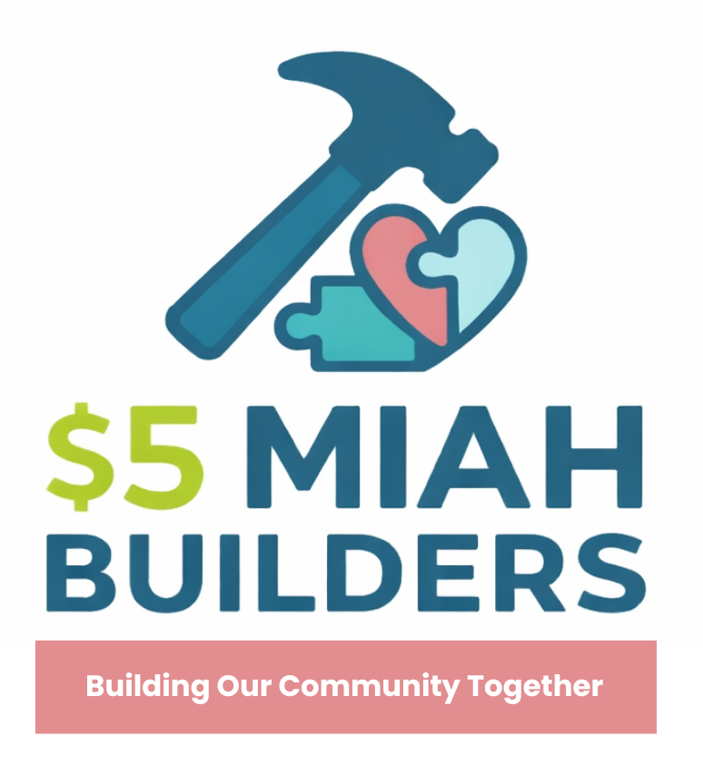 Aerial view of a community with a large central building surrounded by smaller houses, a soccer field, and a parking lot filled with cars.