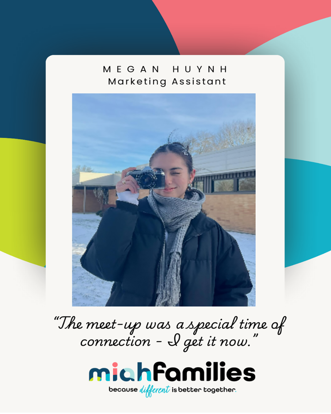 Smiling woman with long wavy hair wearing a white top and dark cardigan.