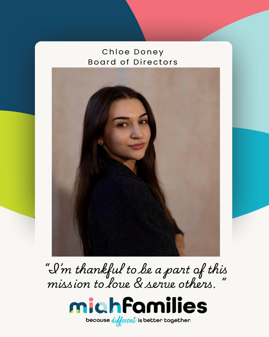 Smiling man with beard wearing a North Face fleece jacket and dress shirt with tie, arms crossed.