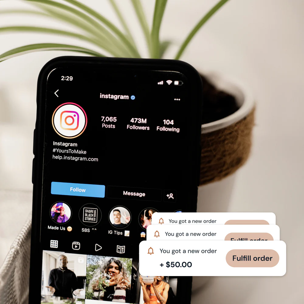 Smartphone displaying Instagram profile with 473 million followers and notifications pop-ups for new orders to fulfill.