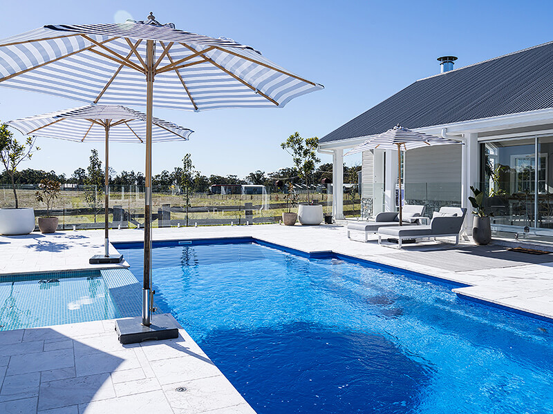 Custom-designed pool with outdoor entertaining area