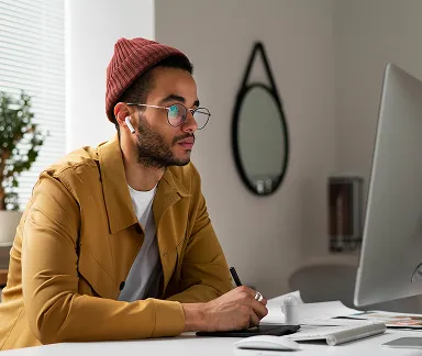 Man Working At Desk