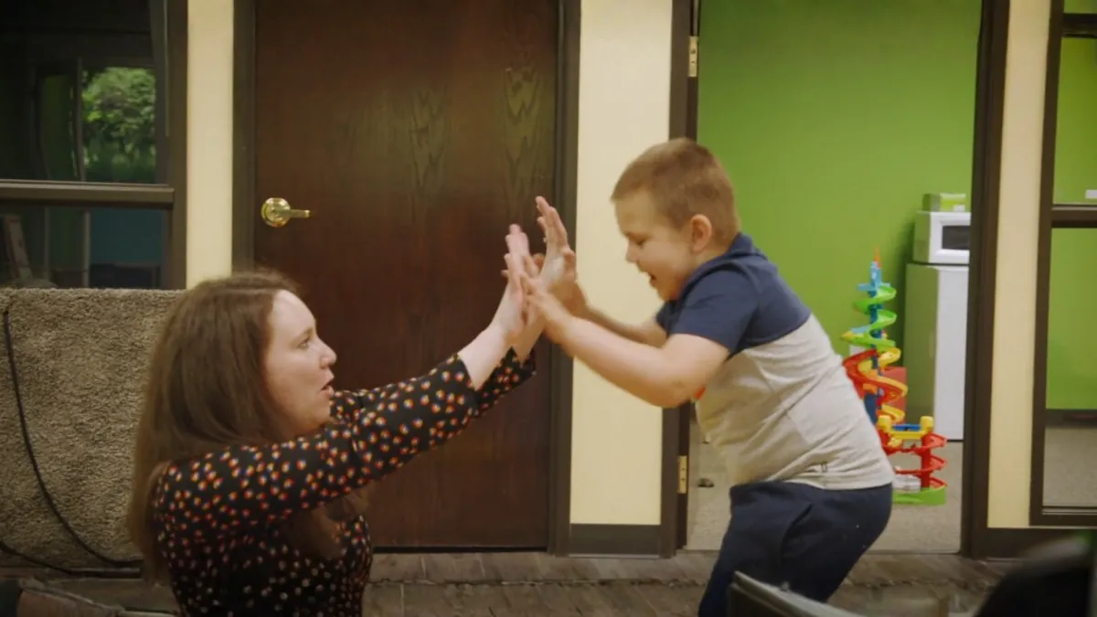 Pediatric Therapist working with child