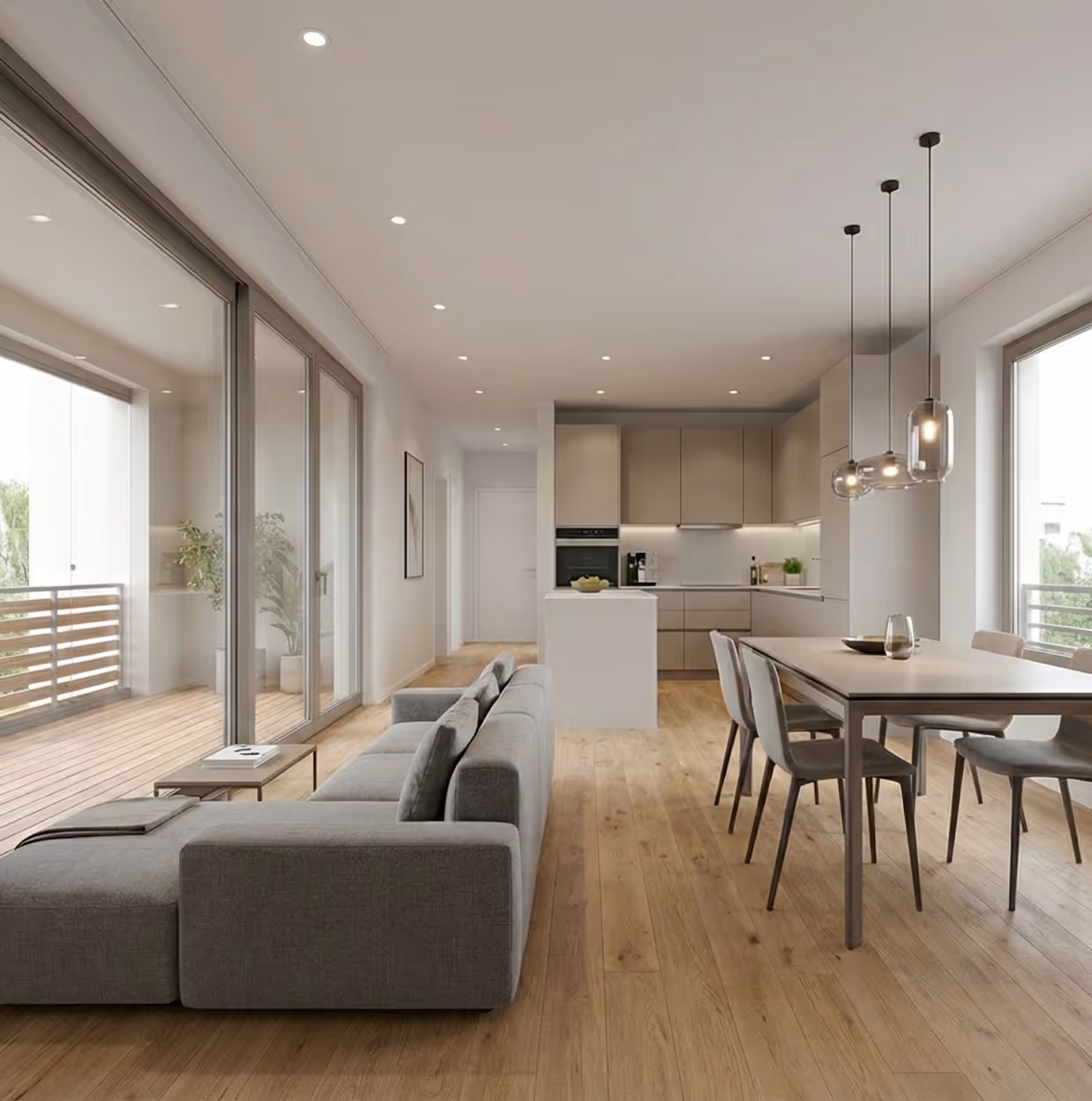 Helles, modernes Wohnzimmer mit grauem Sofa, Essbereich mit vier Stühlen und offener Küche, große Fenster mit Blick auf Balkon.