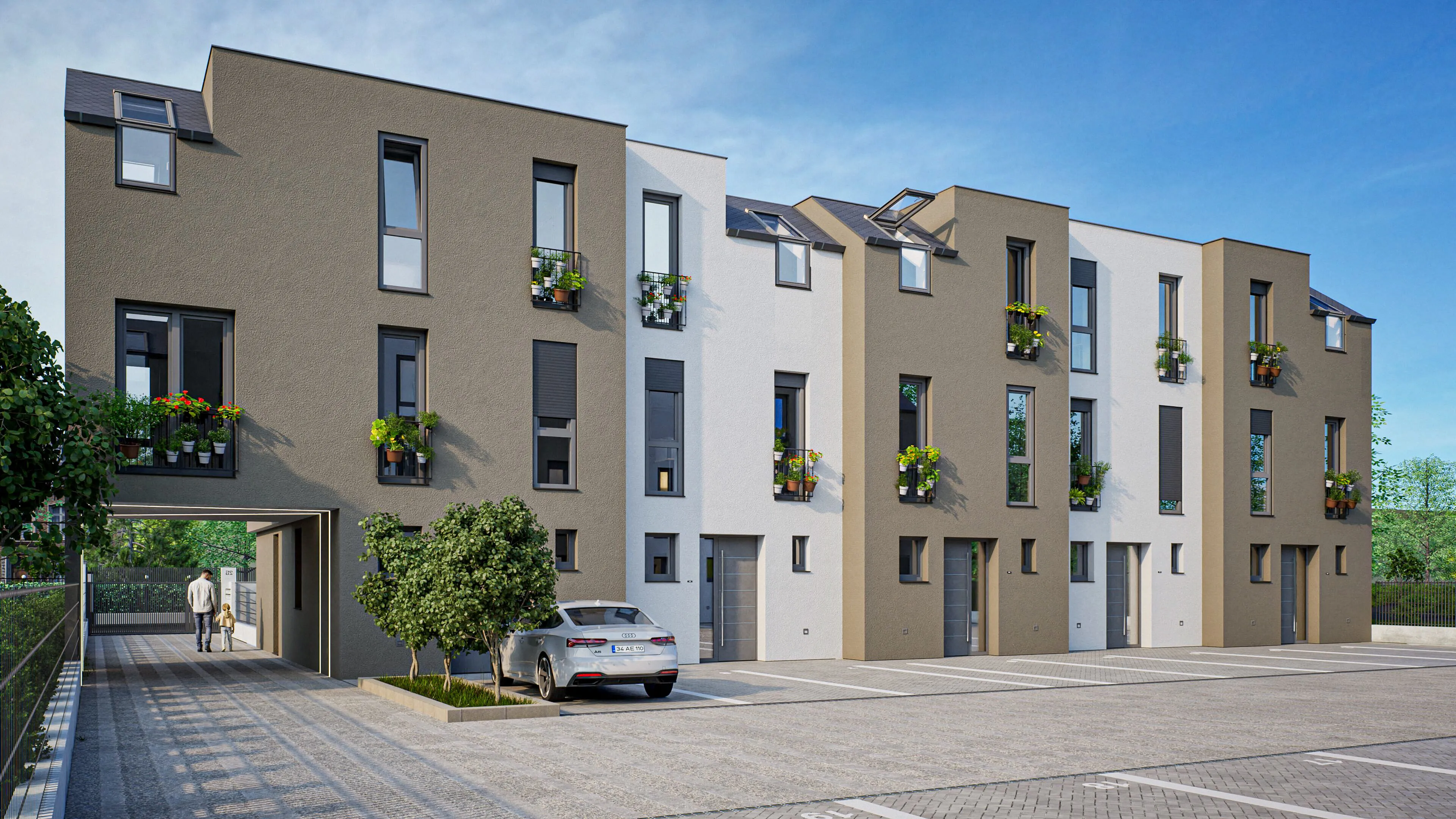 Moderne Reihenhäuser mit Balkonen, bepflanzten Fenstern und Parkplatz vor dem Gebäude an einem sonnigen Tag.