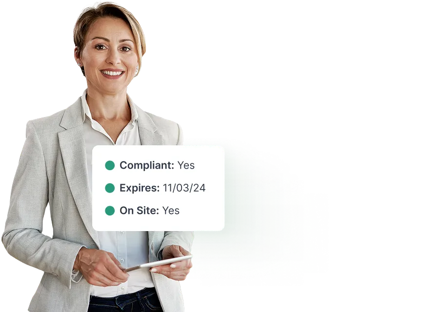 Property manager smiling with a NetVendor bid card showing compliance status