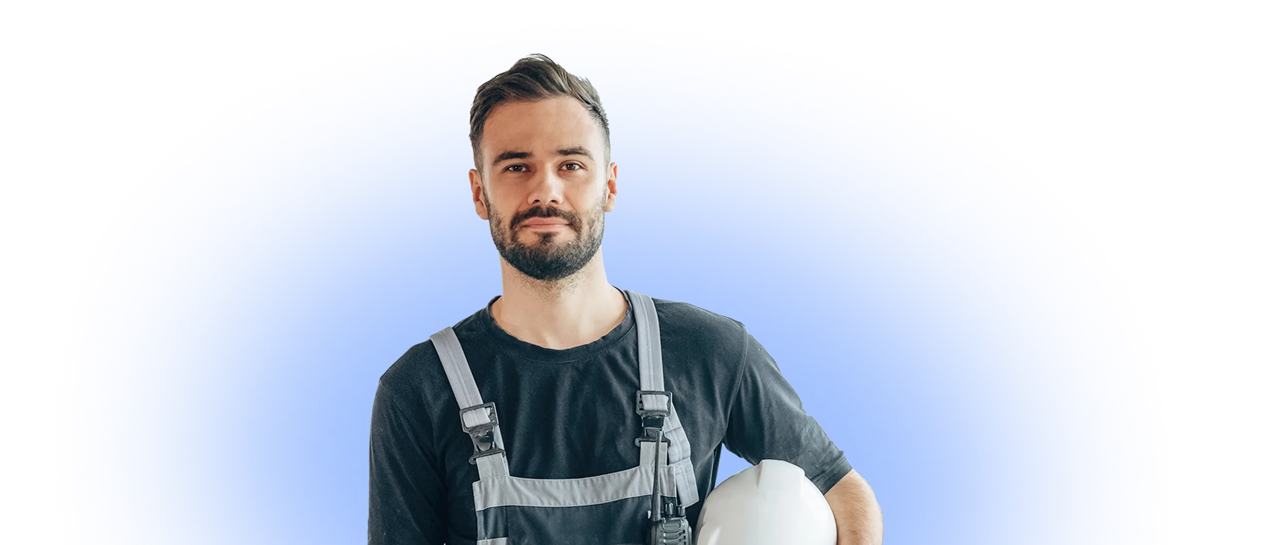 Credentialed contractor in work gear holding hard hat representing vendors in the NetVendor ecosystem