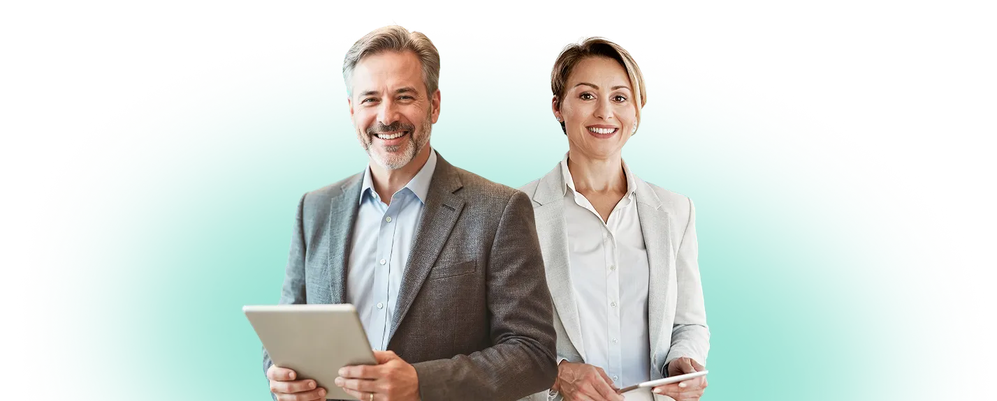 Two property management professionals holding tablets using NetVendor vendor management platform