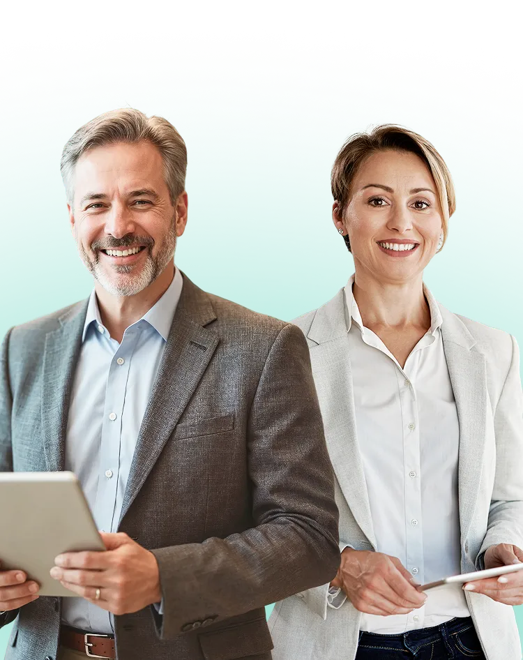 Two property management professionals holding tablets using NetVendor vendor management platform