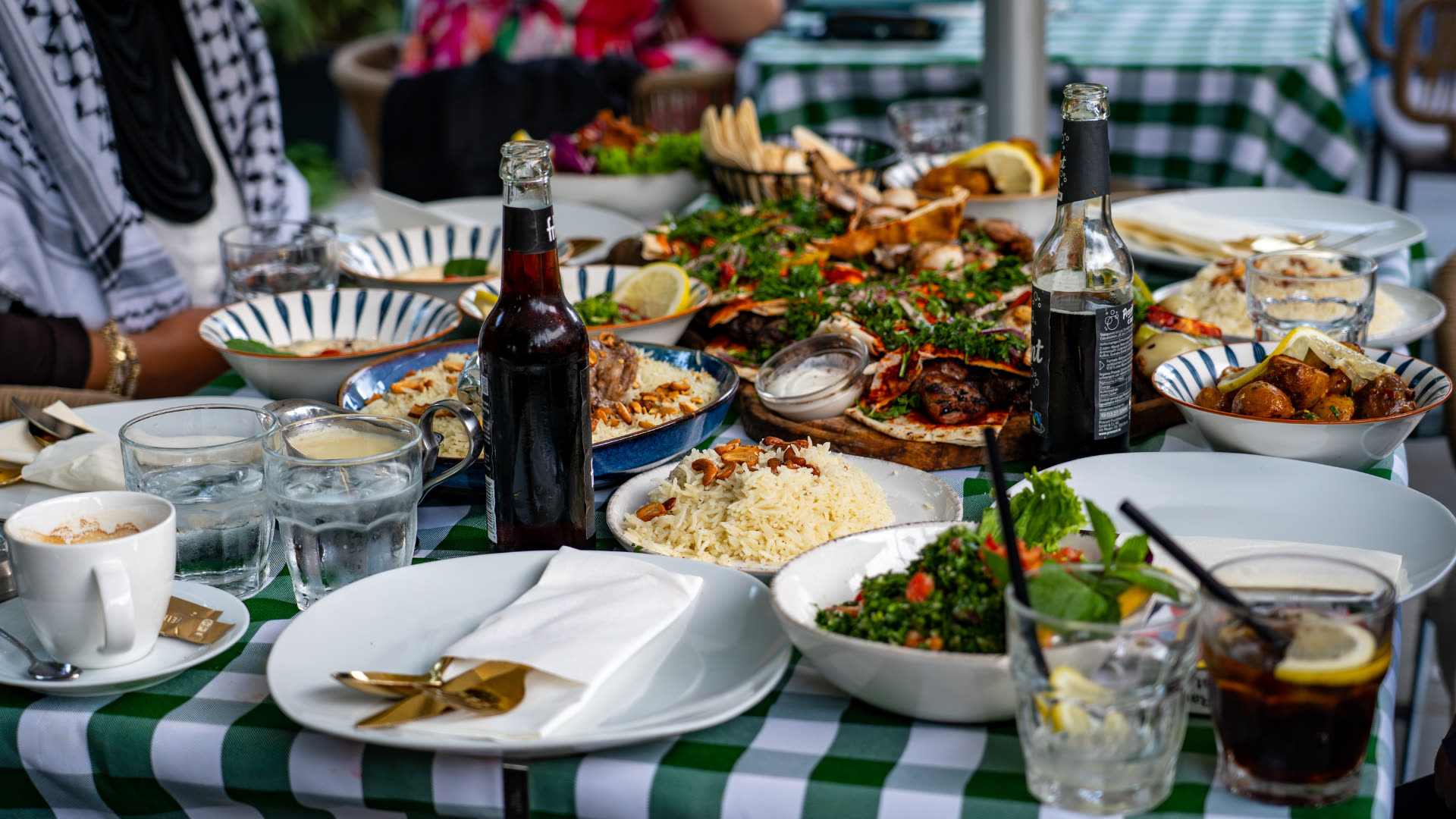 Overhead mezze on green gingham