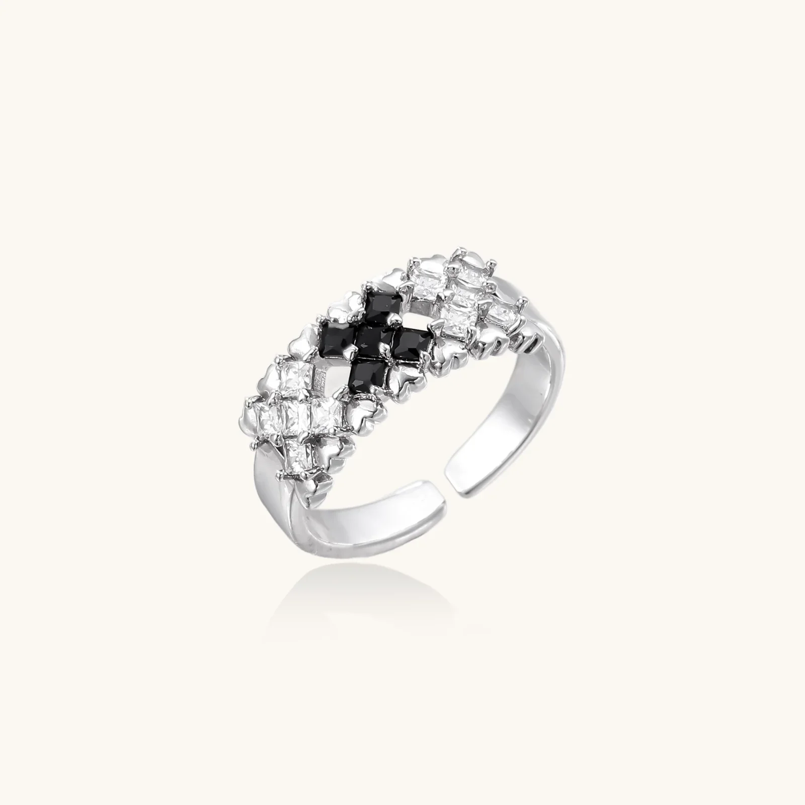 White gold plated adjustable ring with three rows of square zirconia stones in black or pink chevron pattern
