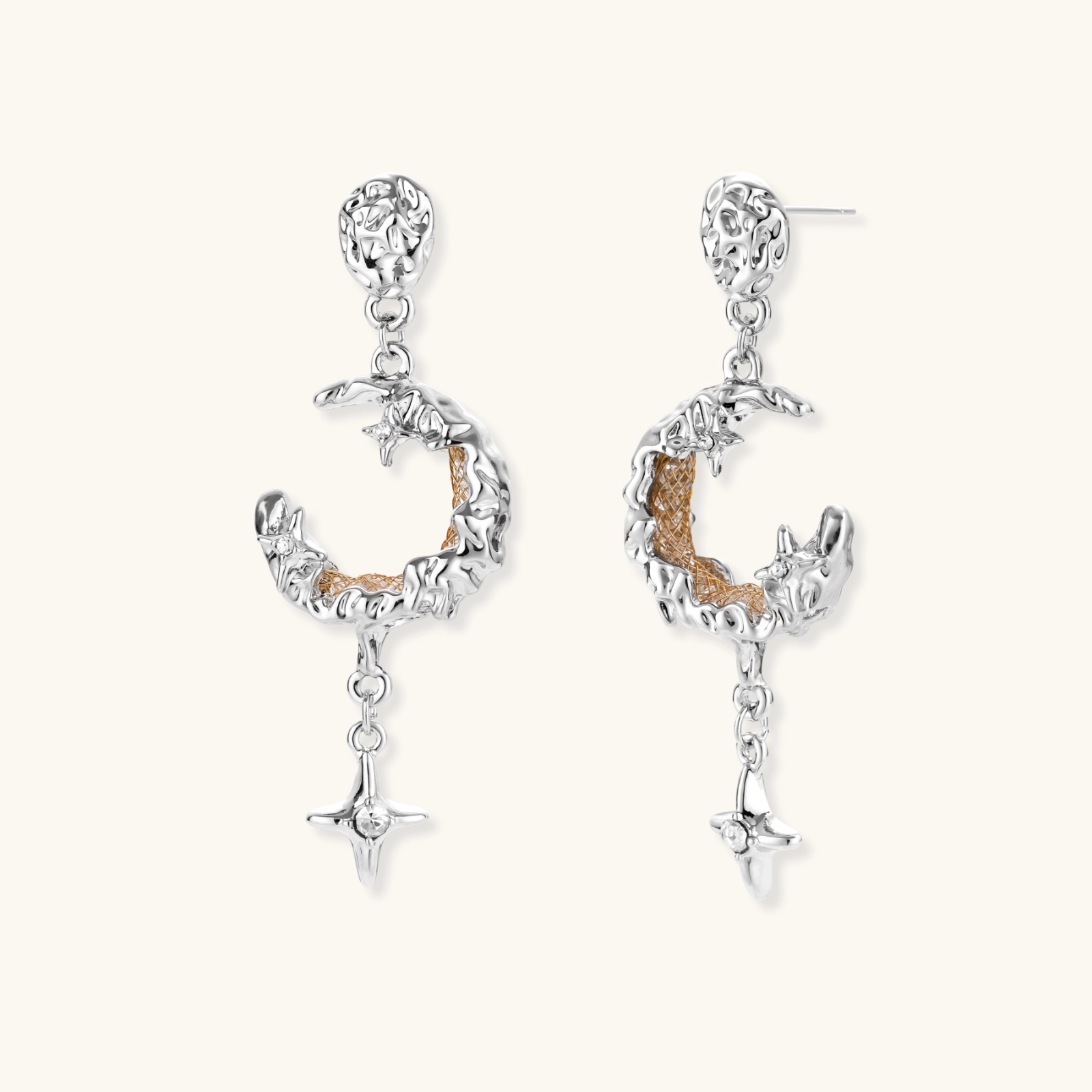 Detailed eco-brass dangle earrings featuring crescent moons with gold rope details and dangling star charms on white background.