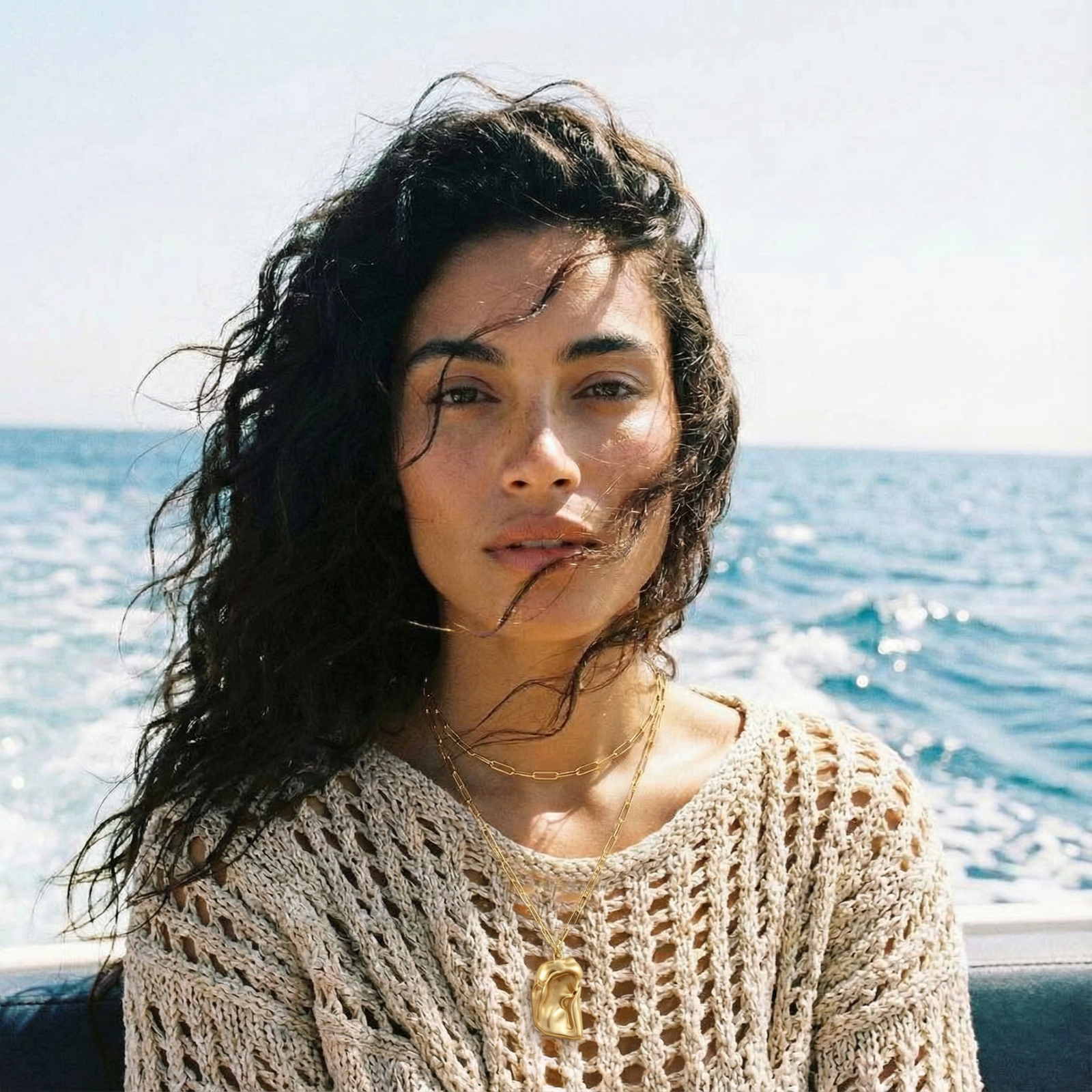 Layered paperclip chain necklace with organic flowing pendant made from eco-zinc alloy in warm gold finish