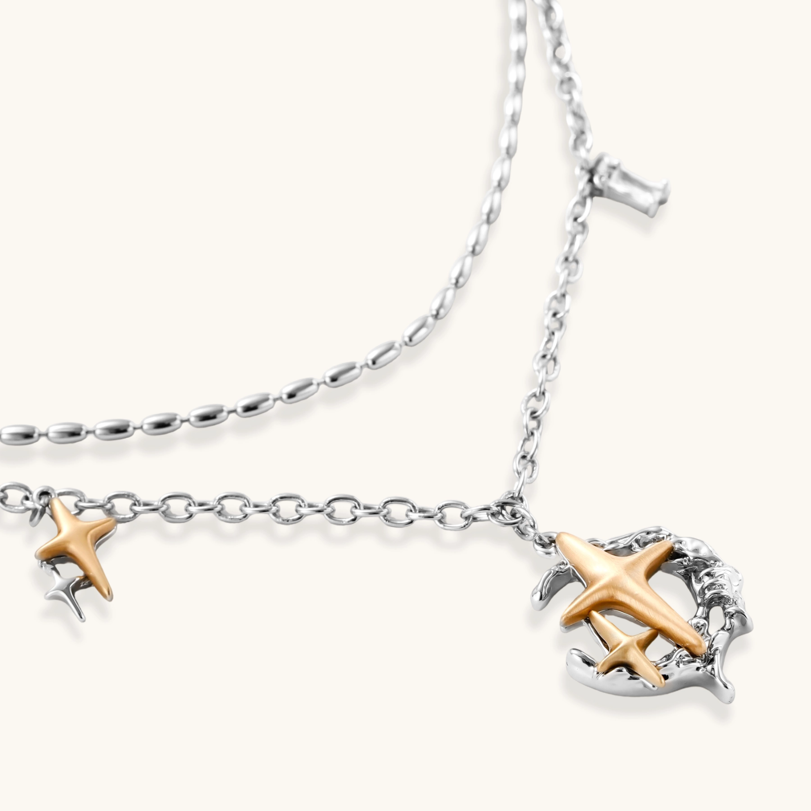 Layered silver-tone necklace set featuring star charms and crescent moon pendant with eco-friendly zinc alloy construction