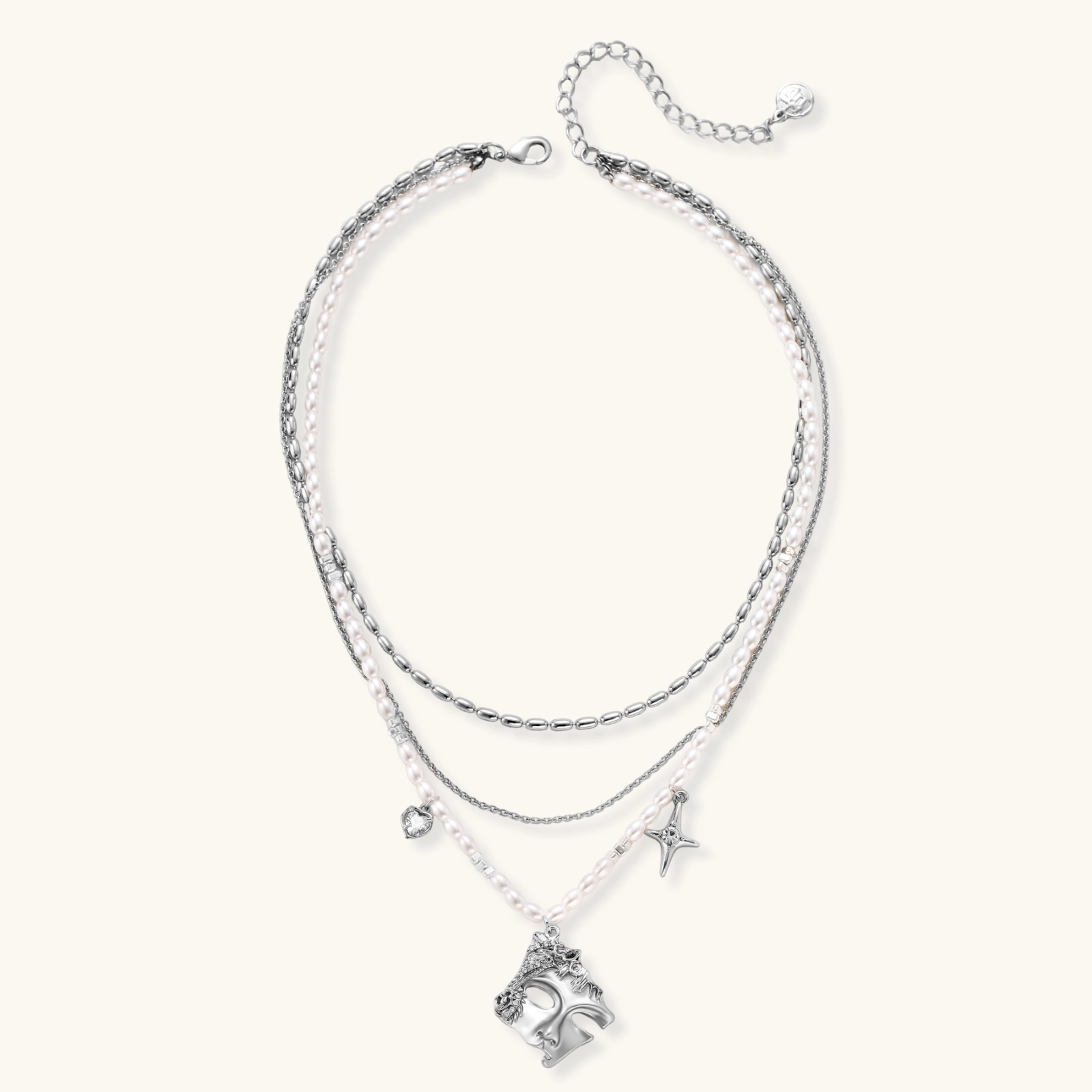 Multi-strand layered necklace set with silver chains, white pearls, star charm, heart pendant, and ornate decorative piece