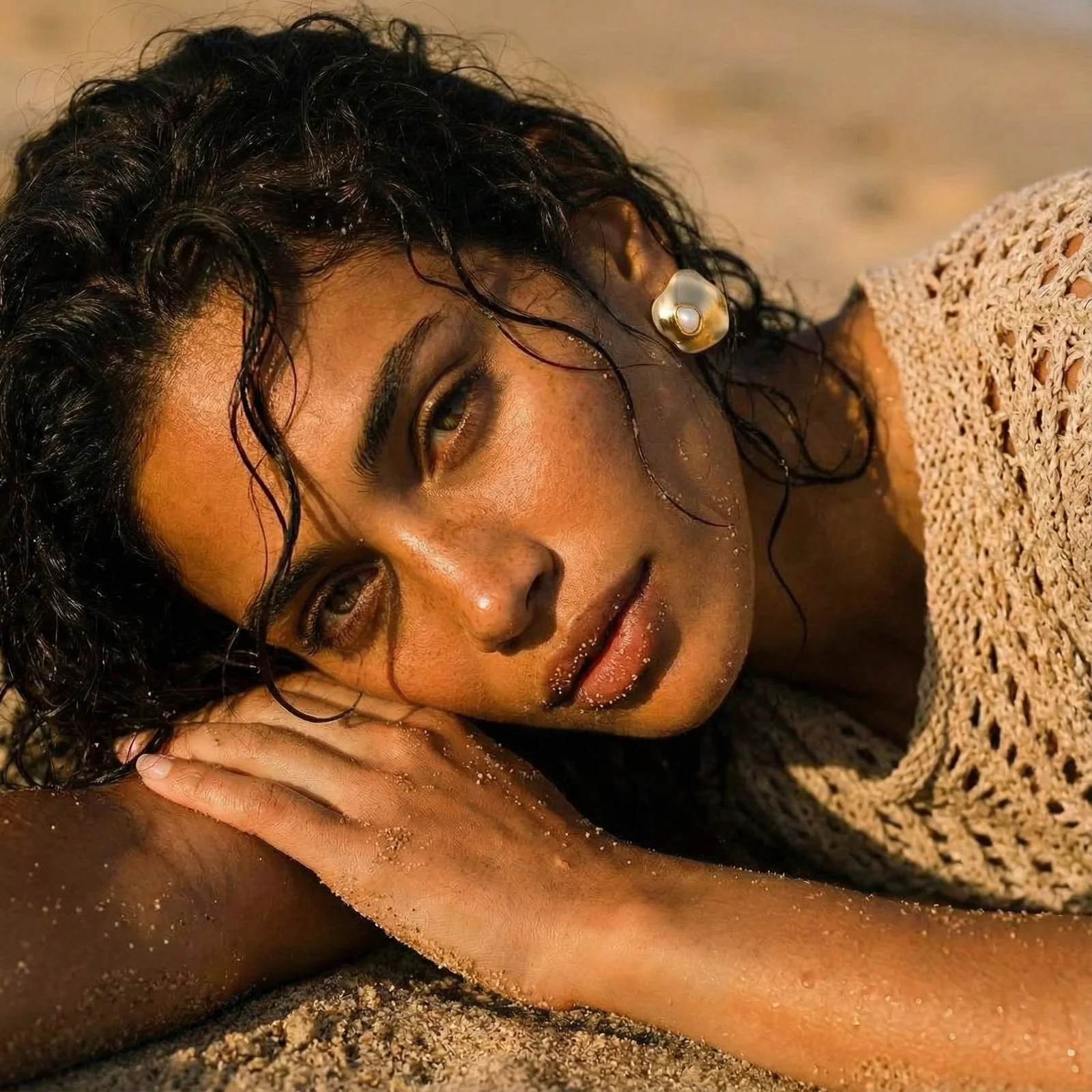 Organic-shaped eco-zinc alloy stud earrings with resin pearl centers and sterling silver posts on white background.