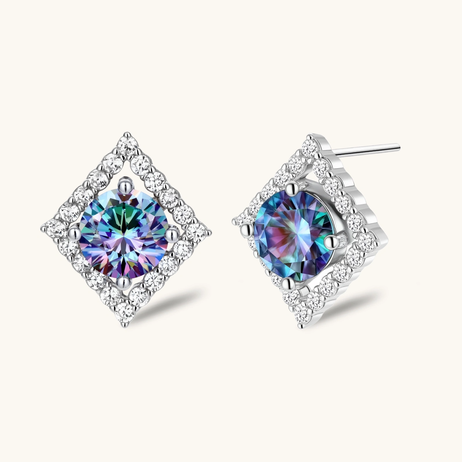 Diamond-shaped sterling silver stud earrings with rainbow moissanite centers surrounded by crystal halos