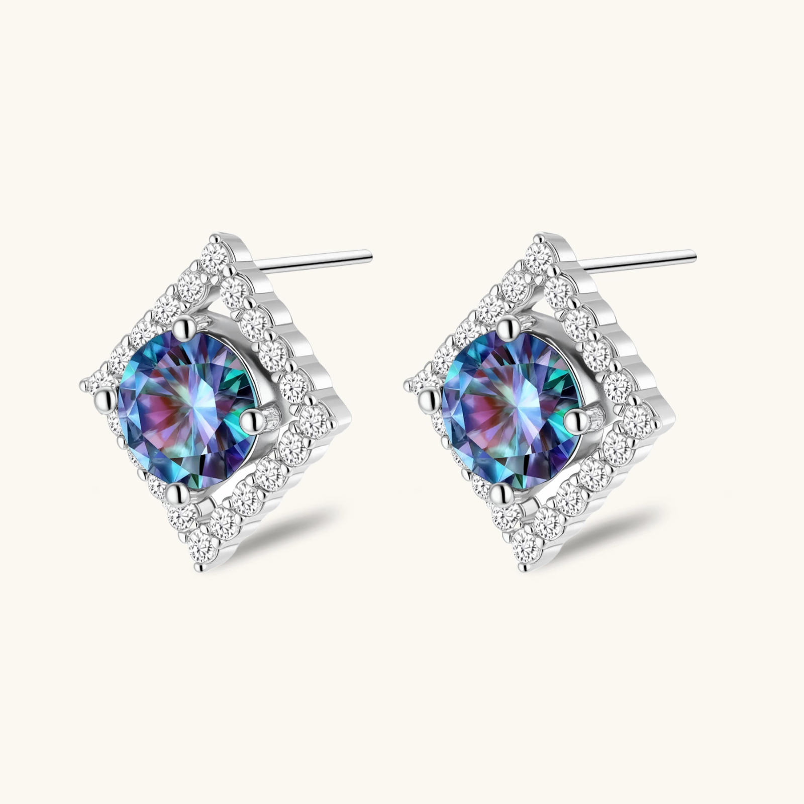 Diamond-shaped sterling silver stud earrings with rainbow moissanite centers surrounded by crystal halos