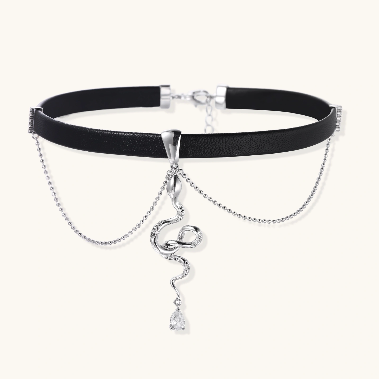Black leather choker with white gold-plated serpent pendant adorned with zirconia crystals and teardrop charm
