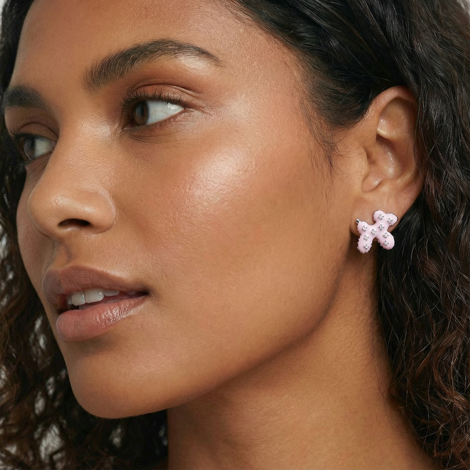 Glossy pink enamel balloon dog stud earrings with crystal details on white gold plated brass, museum-inspired design