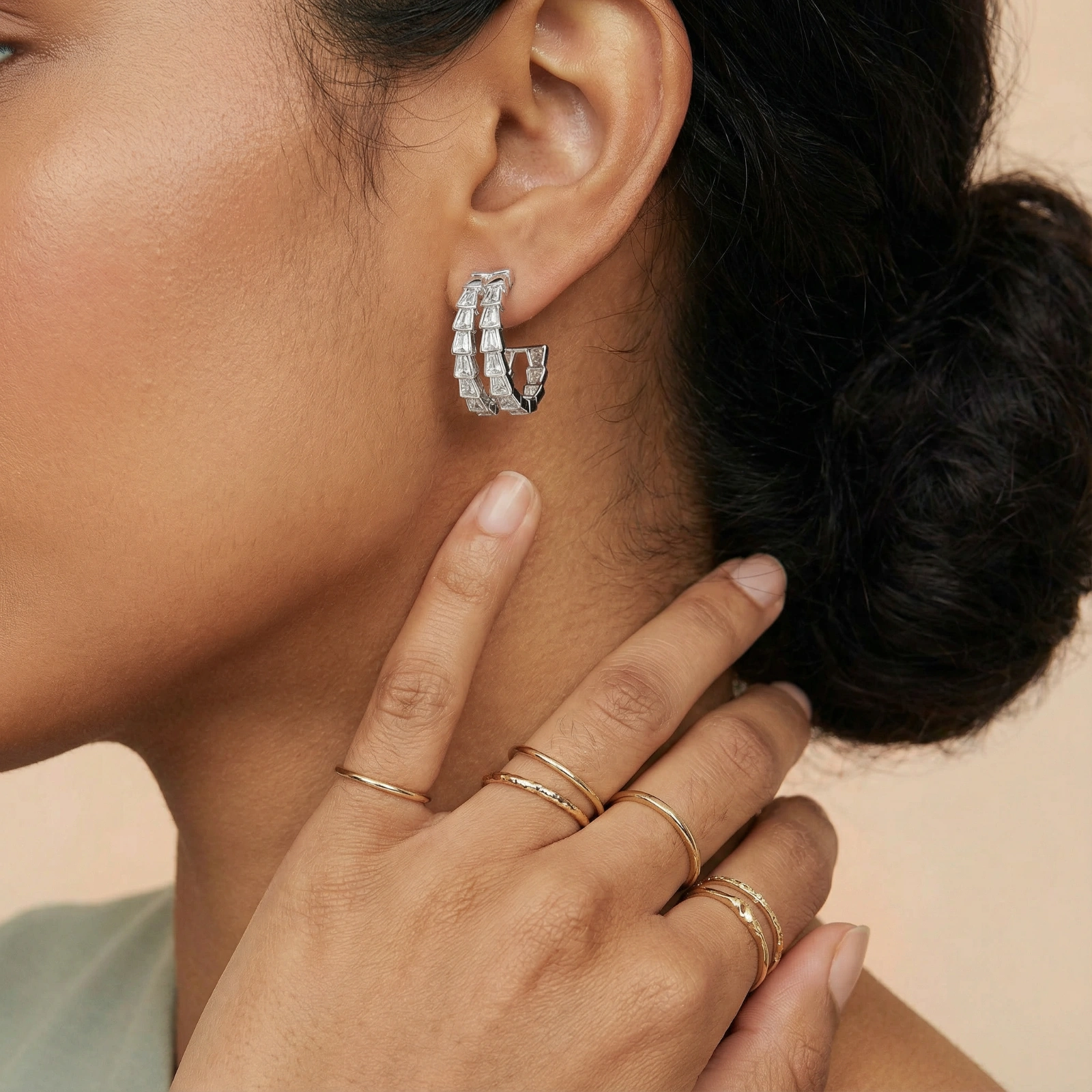 White gold-plated hoop earrings with double row of baguette-cut zirconia stones in geometric ladder design