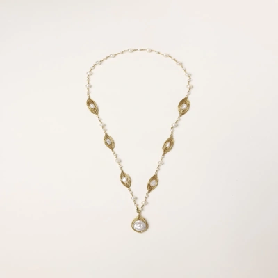 14K gold plated necklace with organic leaf motifs and freshwater pearls arranged in an elegant chain design on neutral background.