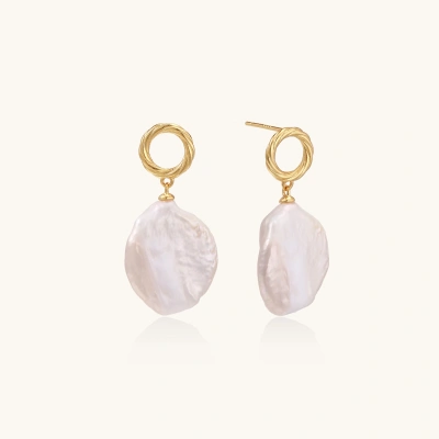 18K gold vermeil twisted circle studs with organic white baroque pearl drops on cream background