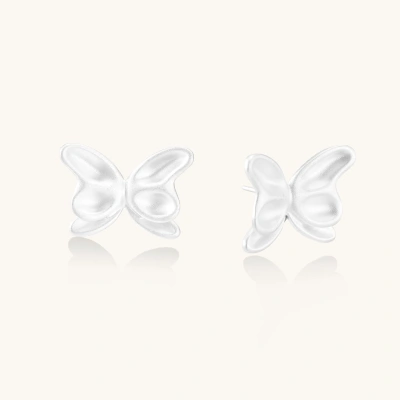 Pair of translucent butterfly-shaped stud earrings with frosted finish and dimensional wing details on white background