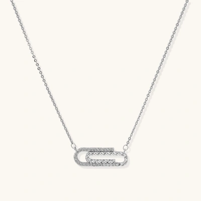 White gold plated necklace with dual-frame geometric pendant featuring crystal pavé border on pale background.