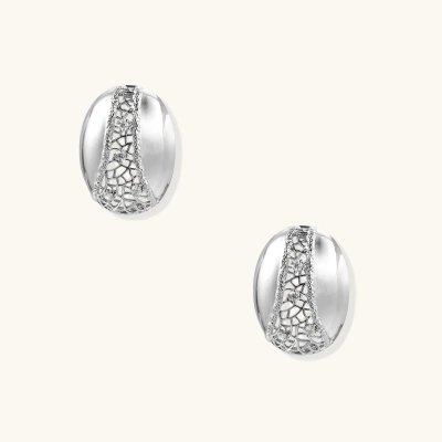 White gold-plated dome hoop earrings with geometric lattice pattern and zirconia stones on cream background