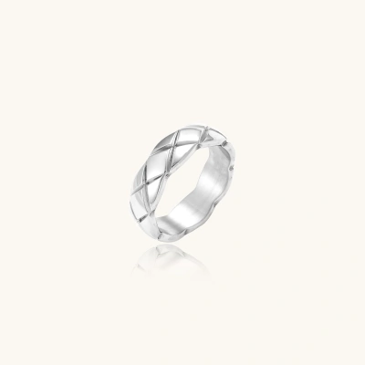 Braided stainless steel band ring with geometric interwoven strands in brushed silver finish on white background