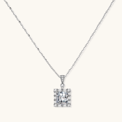 Square moissanite pendant with halo setting on delicate sterling silver chain against white background.
