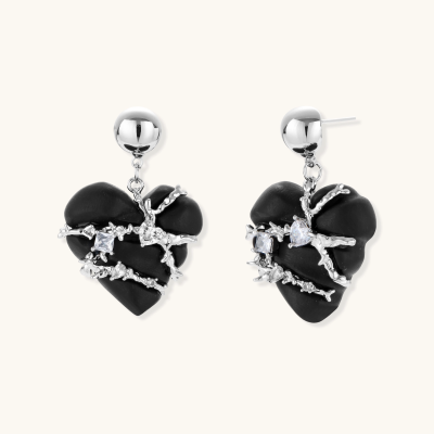 Heart-shaped wood earrings wrapped in silver wire with zirconia crystals, featuring ball stud posts on white background.