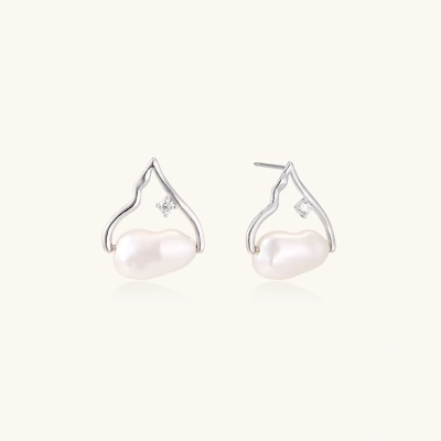 Silver mountain outline studs with baroque pearl and diamond accent on white background