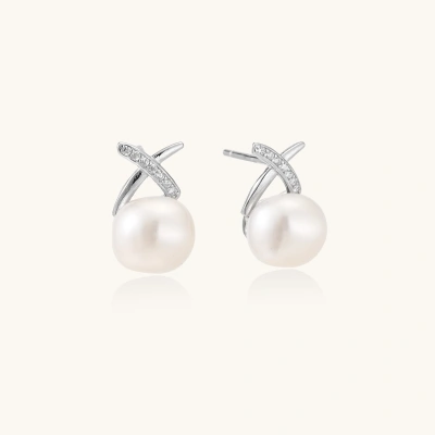 Rhodium-plated silver stud earrings with sparkling X design above lustrous round freshwater pearls on white background.