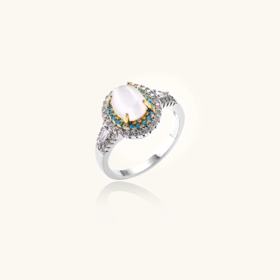Vintage-style cocktail ring with luminous cat's eye center stone surrounded by turquoise and crystal double halo on white gold plated band