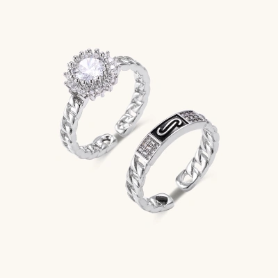 Two adjustable white gold plated rings with chain-link bands, featuring cubic zirconia halo and enamel details